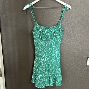 Woman’s green and white size small romper